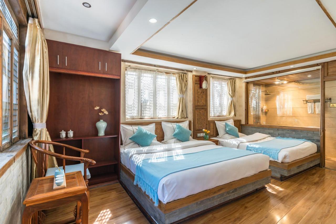 He Mu Ju Inn Zhongyi Branch Лицзян Экстерьер фото