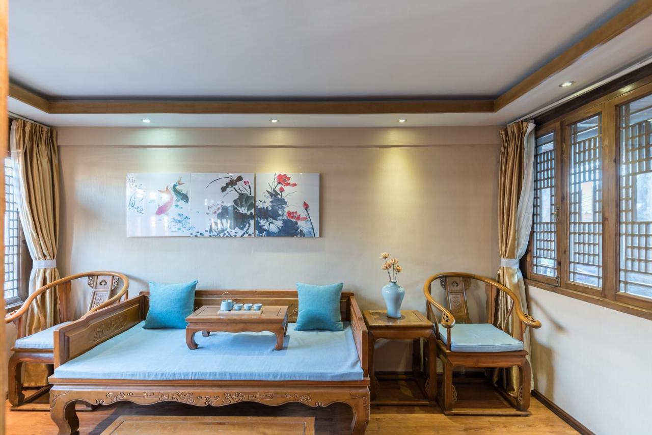 He Mu Ju Inn Zhongyi Branch Лицзян Экстерьер фото