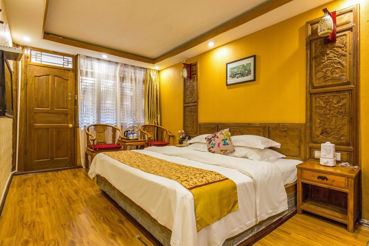He Mu Ju Inn Zhongyi Branch Лицзян Экстерьер фото