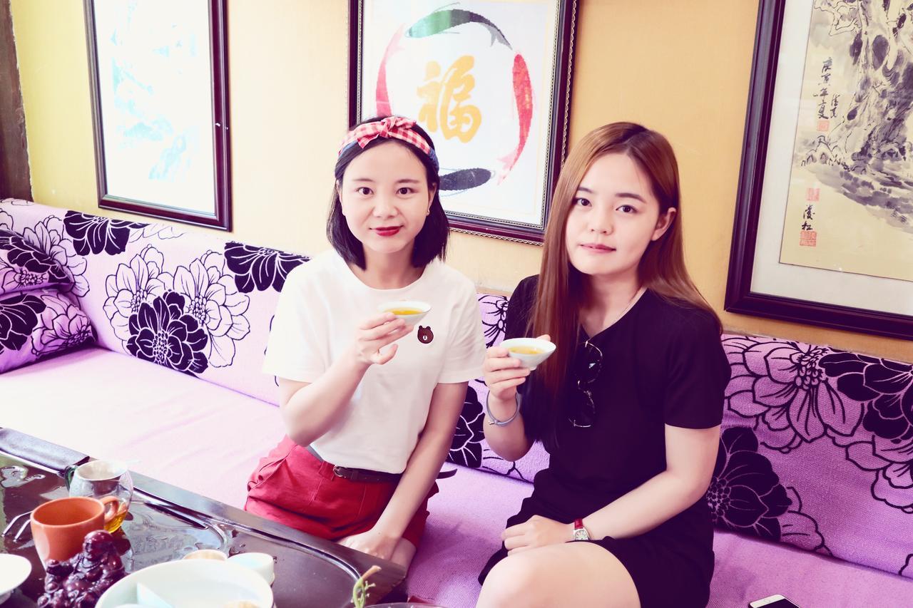 He Mu Ju Inn Zhongyi Branch Лицзян Экстерьер фото