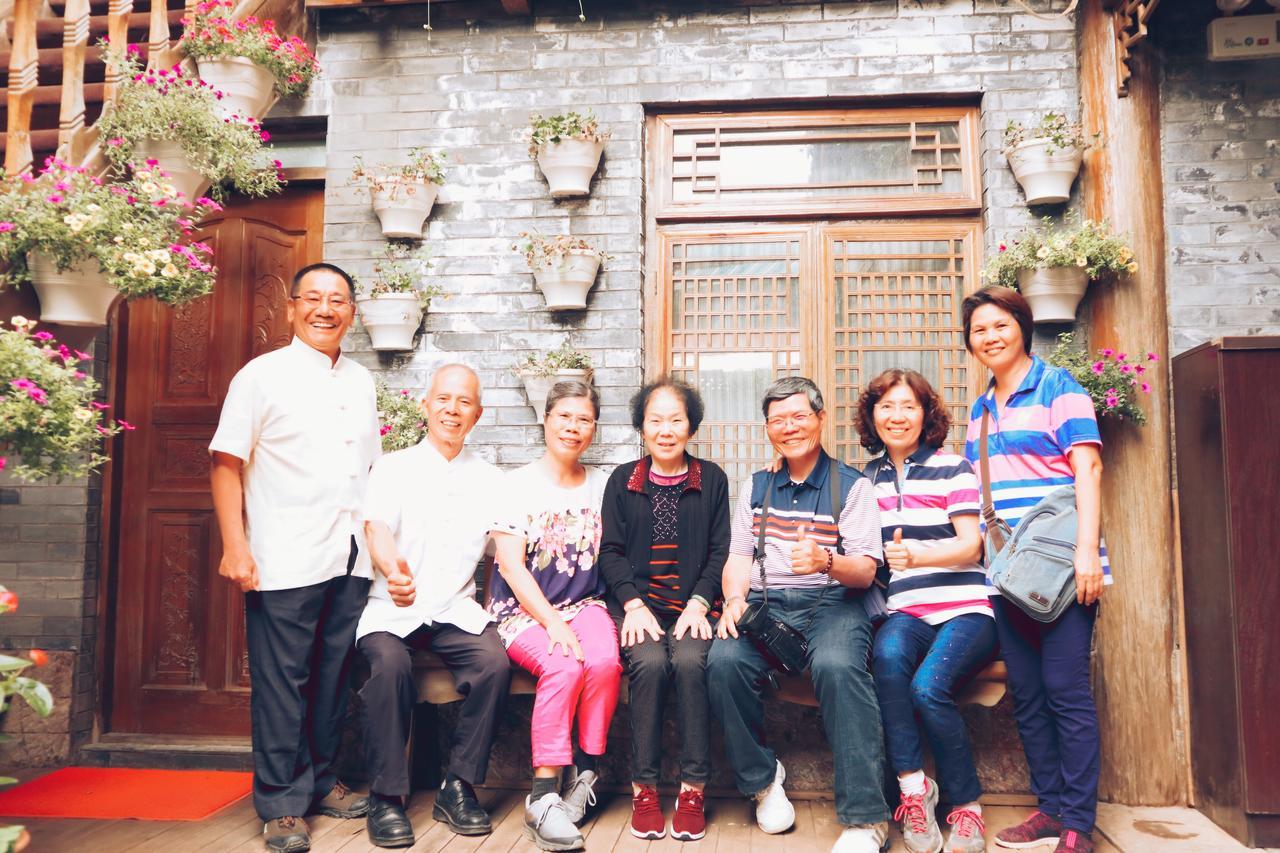 He Mu Ju Inn Zhongyi Branch Лицзян Экстерьер фото