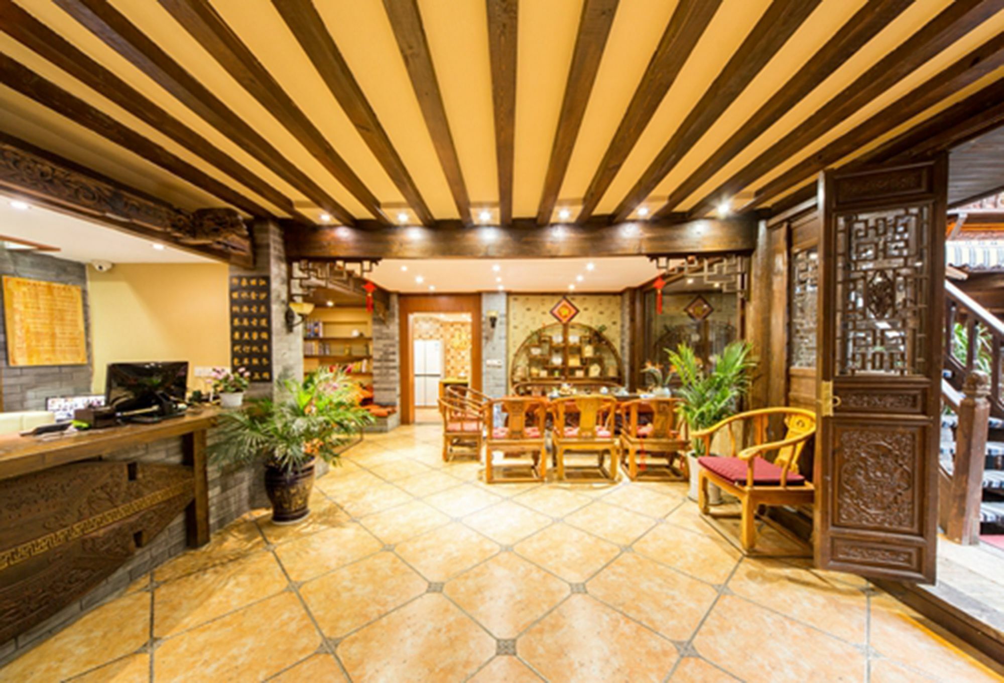 He Mu Ju Inn Zhongyi Branch Лицзян Экстерьер фото