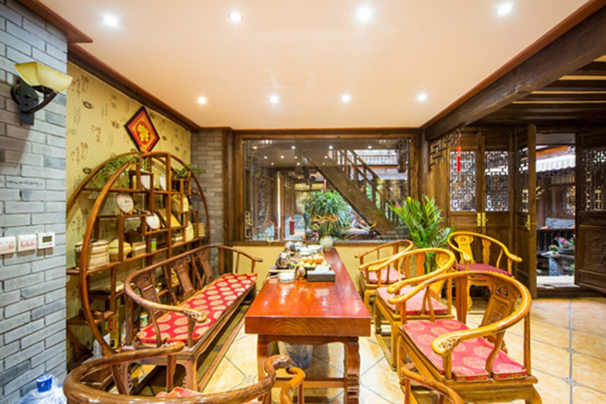 He Mu Ju Inn Zhongyi Branch Лицзян Экстерьер фото