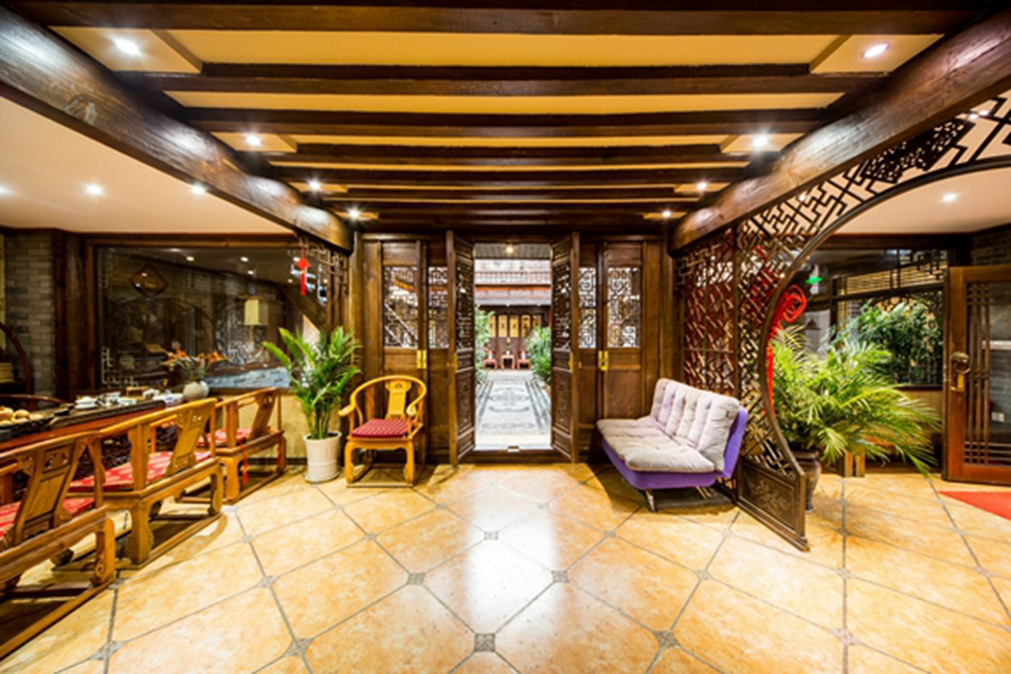He Mu Ju Inn Zhongyi Branch Лицзян Экстерьер фото