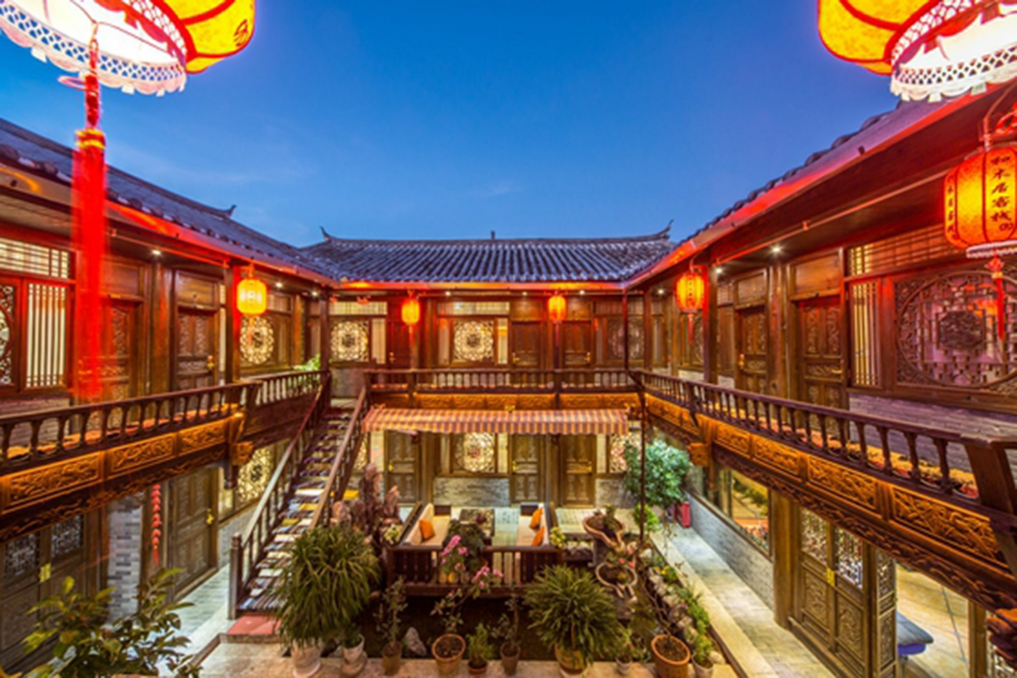 He Mu Ju Inn Zhongyi Branch Лицзян Экстерьер фото